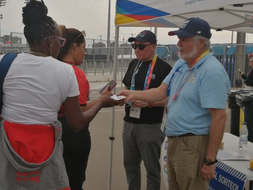 Gonzalo Bravo hands out a questionnaire Pan American Games.