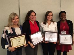 Faculty and students displaying 2017 WVAPHERD awards