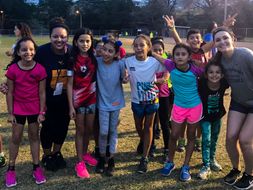 Students and children posing after Soccer Game in Mexico
