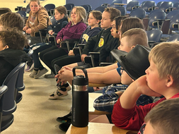 Students from Crellin Elementary School look on during a presentation from WVU students.