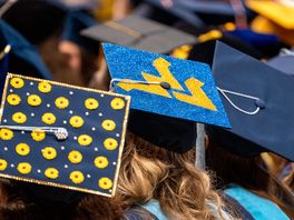 Decorated graduation caps worn by students at commencement